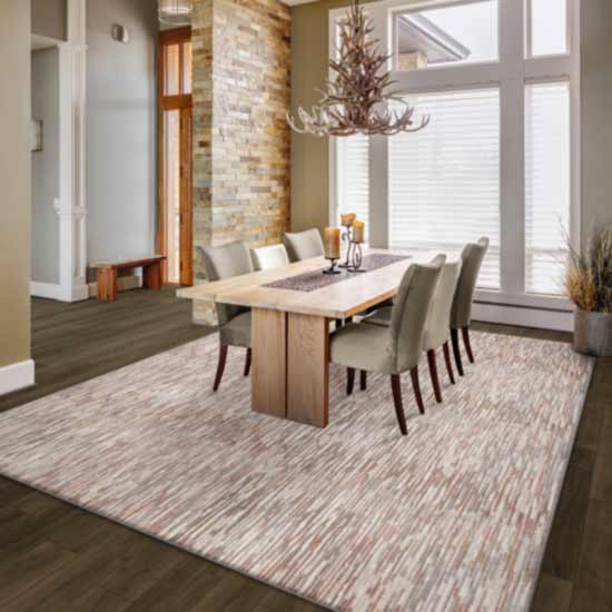 statement red patterned area rug in dining room